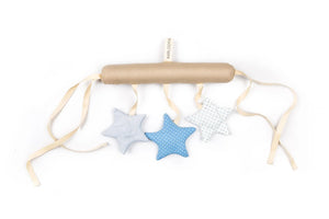 Nursery cot mobile with blue and white fabric star ornaments and beige hanging straps