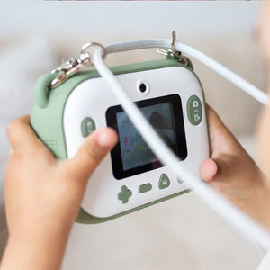 Sage green and white handheld baby monitor with color screen, camera, and lanyard for nursery use