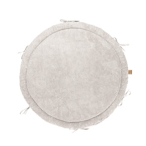 Round vanilla baby nest play mat with soft corduroy texture and crib bumper braid