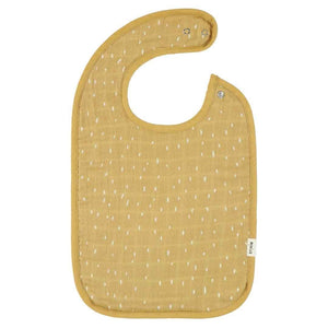 Bavoir bébé en mousseline jaune avec pois blancs et pressions ajustables.