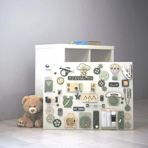 Wooden toddler activity board with gears, zippers, clock, and buttons for sensory play