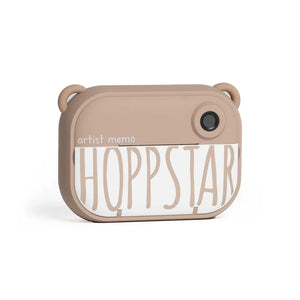 Appareil photo/jeu de mémoire Hoppstar Artist Memo beige avec design ludique et lettrage gras
