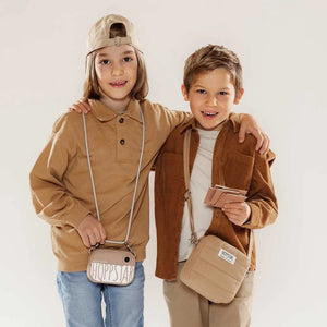 Bambini con borsa fotografica Hoppstar beige e borsa a tracolla midi, stile minimal, colori neutri