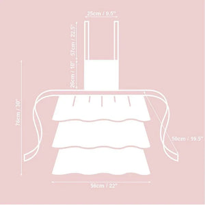 White tiered ruffled apron with measurements, 76cm tall, 56cm wide, for kitchen or nursery use