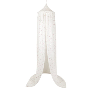 Full-length cream Moi Mili cotton canopy with a delicate red heart print on a white background