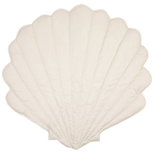 Light cream reverse side of the reversible Moi Mili shell playmat on a white background