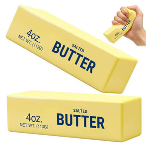 Two yellow butter squishy sticks labeled '4oz. SALTED BUTTER NET WT.