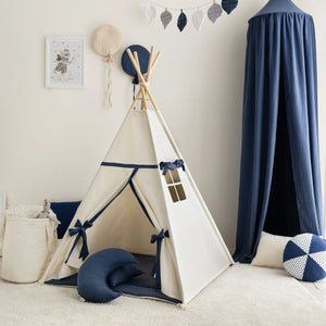 Side view of a beige teepee tent showing the built-in window and navy fabric ties