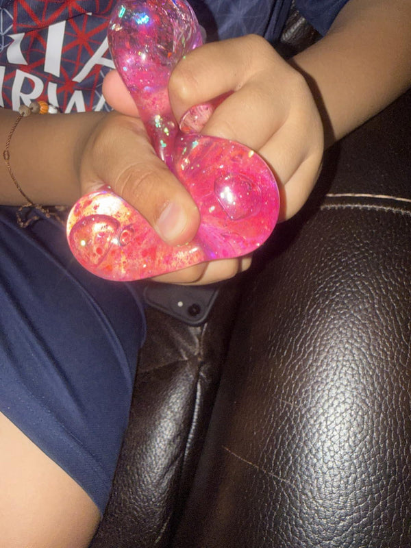 KId is squeezing squishy dumpling.