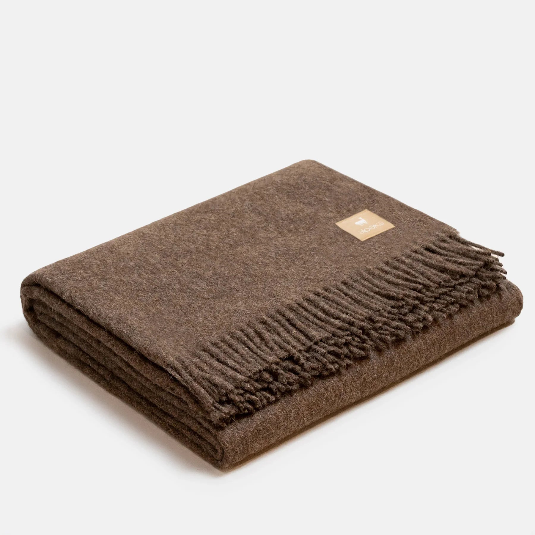 Couverture jetée en laine ALPAKA marron cacao foncé premium, texture douce et franges classiques