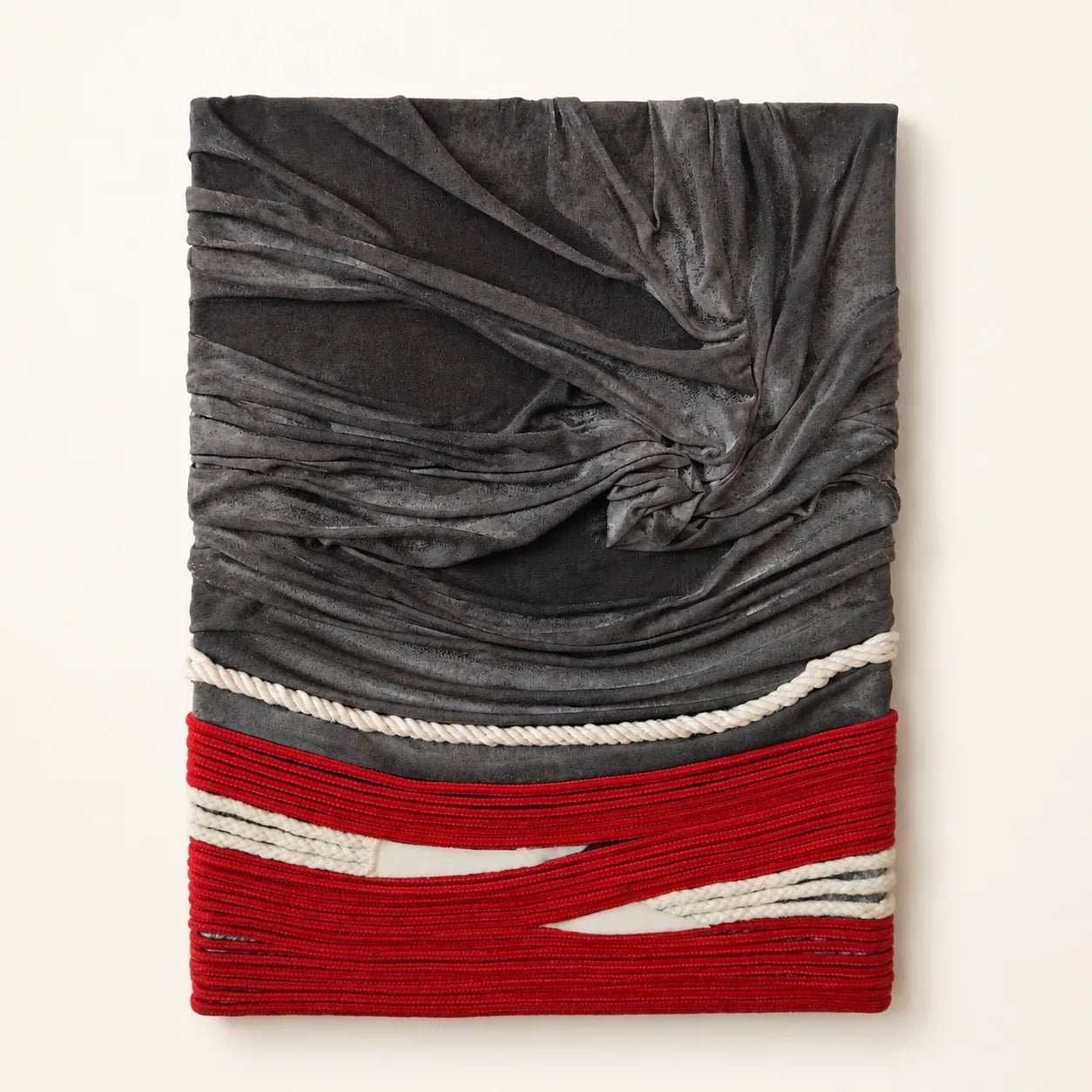 Gray velvet wall art with red and white rope accents, textured European craftsmanship