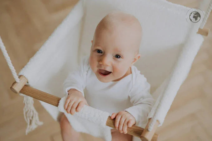 BaBi Babyschaukel – Bouclé Schneeweiß