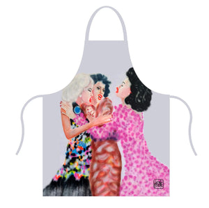 Grey apron with colorful artwork of three women in patterned dresses, one in pink polka dots, one in floral, one in swirls
