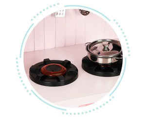 Rosa Herdplatten mit schwarzen Details und Spielzeug-Topf aus Metall