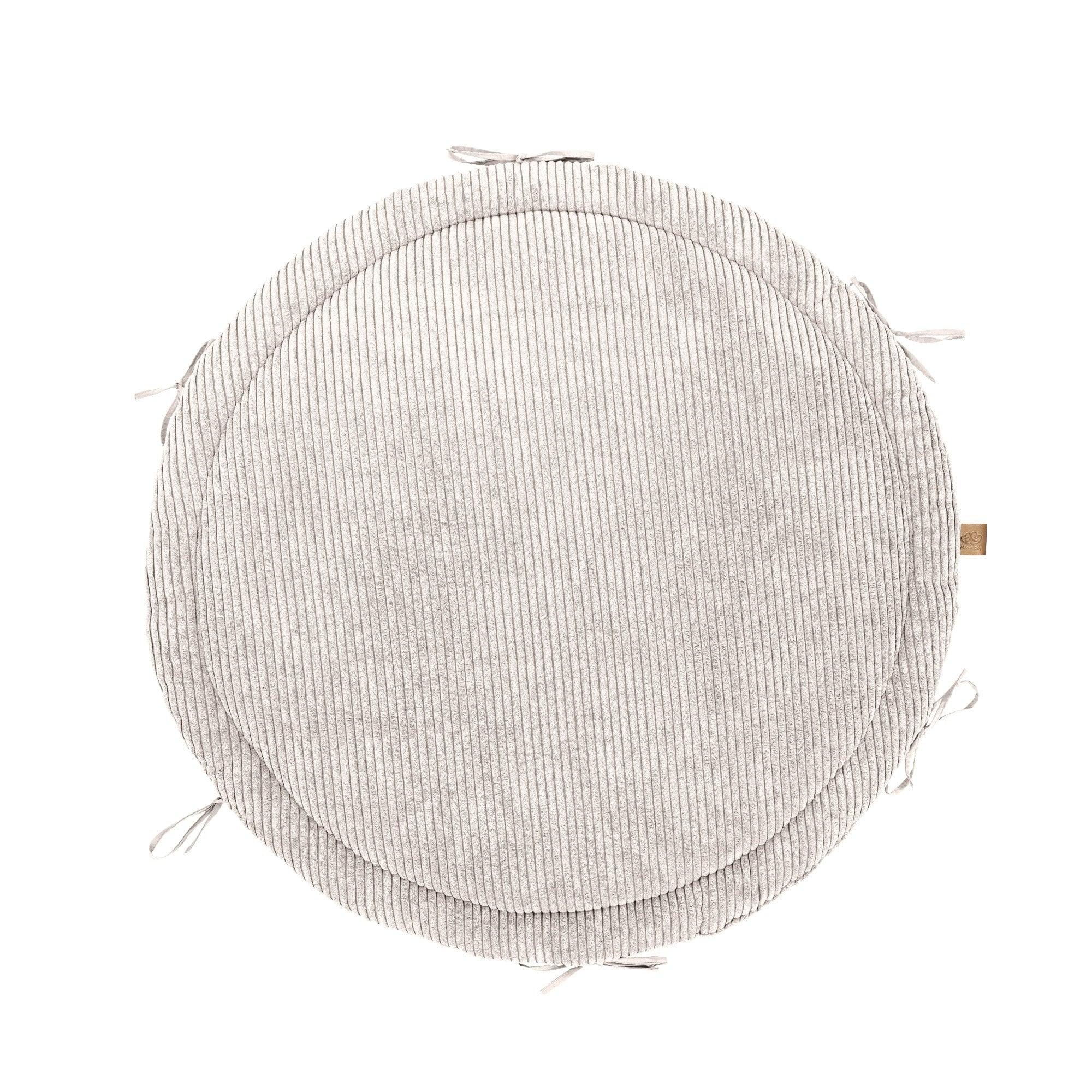 Tapis d'éveil rond couleur vanille avec texture velours côtelé douce et tour de lit tressé