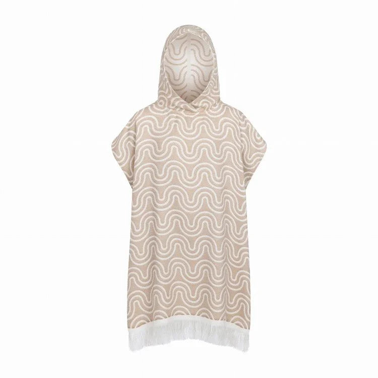 Kids bamboo bath poncho in sand color with wavy pattern and fringe hem