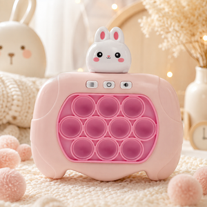 Pink bunny electronic Pop It console displayed in a cosy children’s bedroom