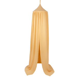 Full-length butter yellow cotton canopy by Moi Mili with flowing fabric and an open front on a white background