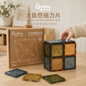 Child building a cube with Onshine Natural Colour Magnetic Tiles in translucent earthy colours