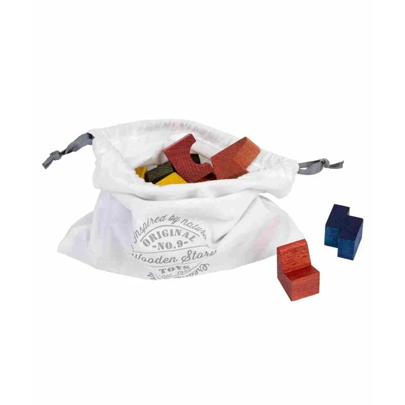 Wooden building blocks in white drawstring bag, natural wood tones, red and blue pieces, artisan toy set