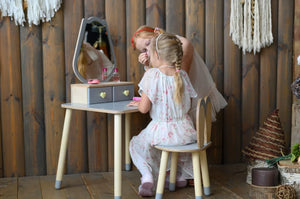 Gray FAMILY Tulip Beauty Table and chair used during pretend beauty play