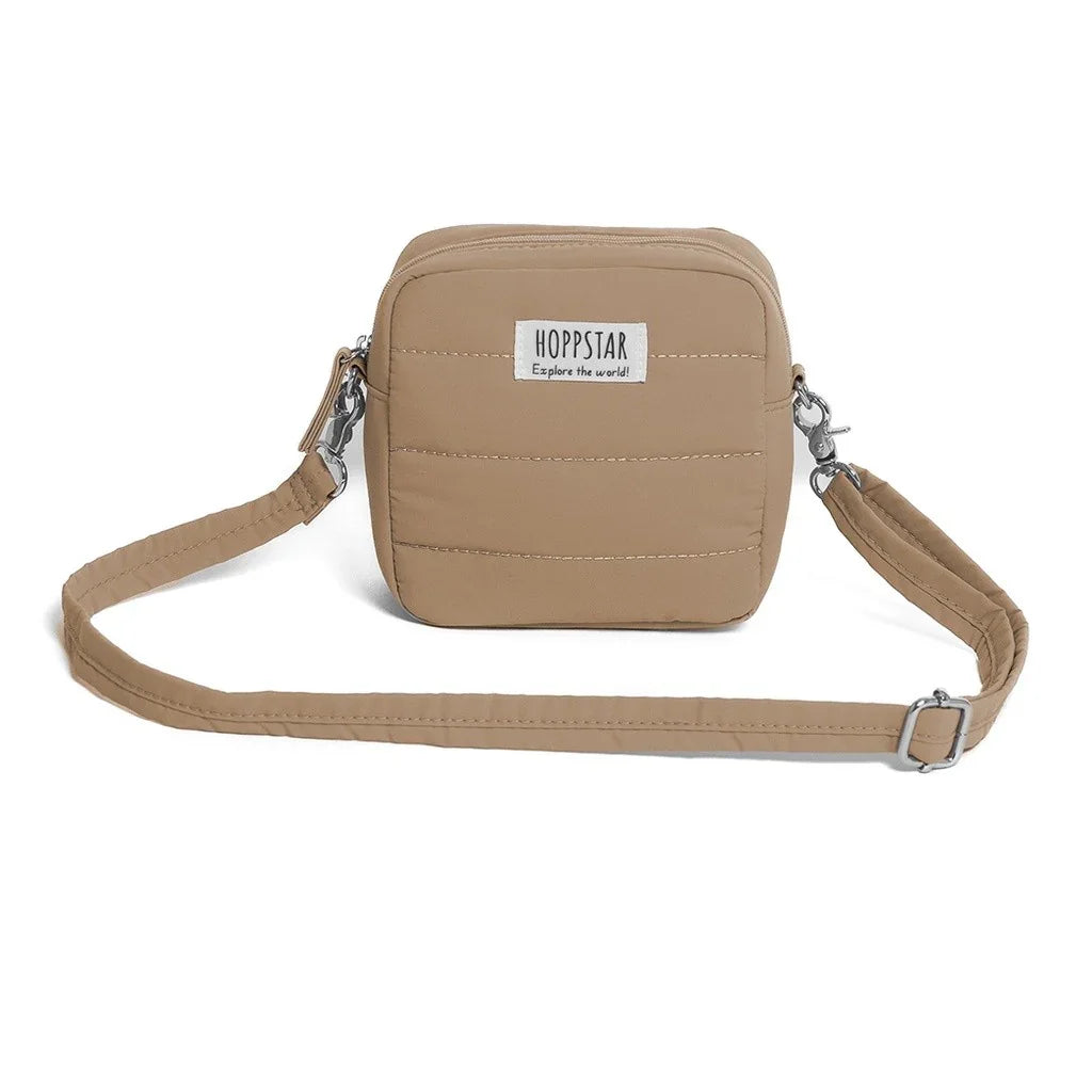 Borsa fotografica Hoppstar beige con tracolla regolabile e patch logo frontale