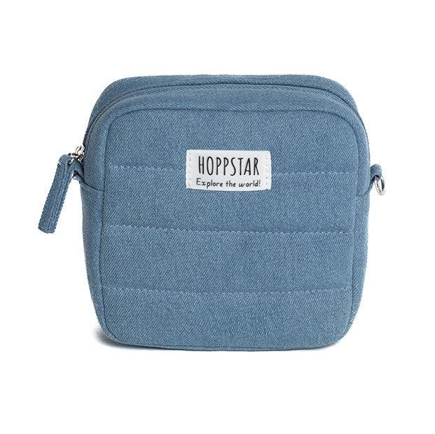Borsa fotografica trapuntata blu con zip ed etichetta Hoppstar frontale