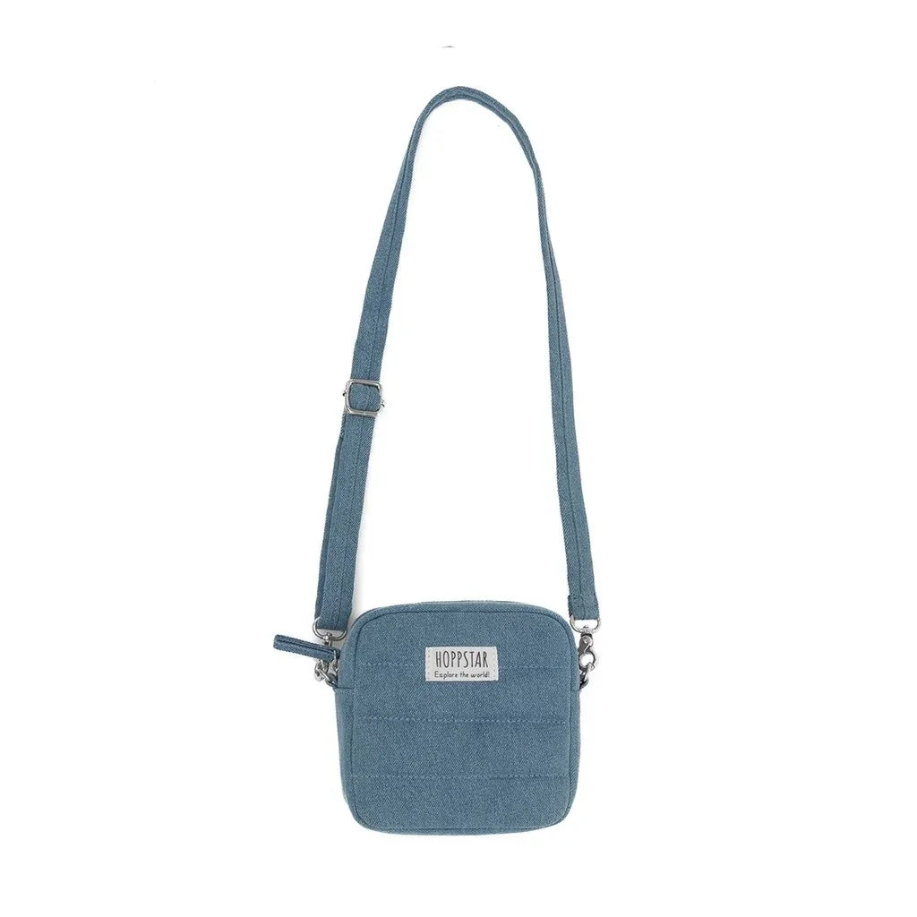 Borsa fotografica in tessuto blu con tracolla regolabile e logo Hoppstar frontale