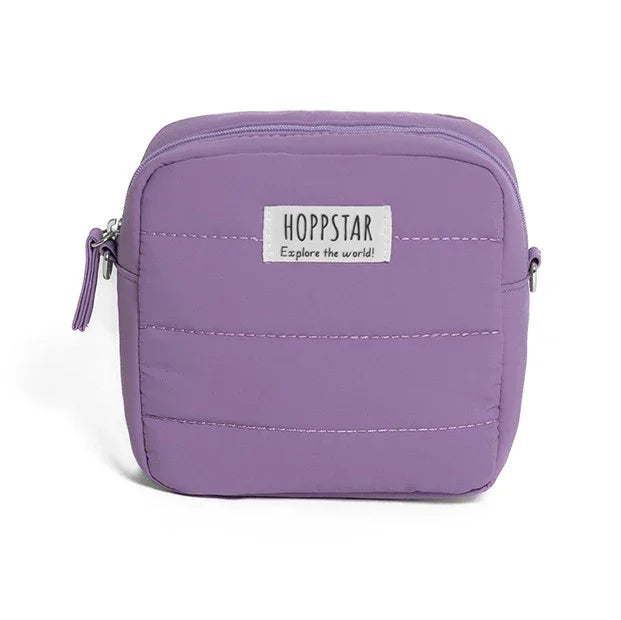 Borsa fotografica Hoppstar in viola pastello con chiusura a zip e cuciture trapuntate