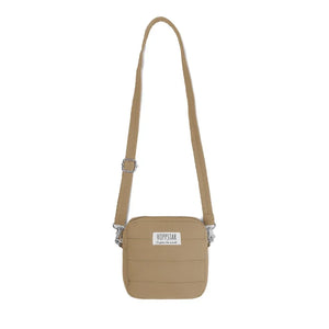 Borsa fotografica Hoppstar midi in beige con tracolla regolabile e patch logo frontale
