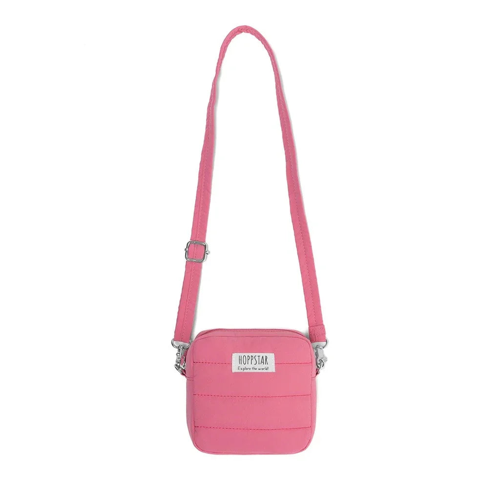 Borsa fotografica Hoppstar midi rosa con tracolla regolabile e patch logo frontale