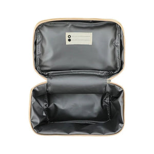 Lunchbox isotherme ouverte, intérieur noir imperméable, fermeture zippée.