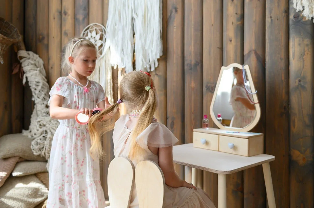 Children playing hairdresser at white FAMILY Tulip Beauty Table with matching chair and mirror