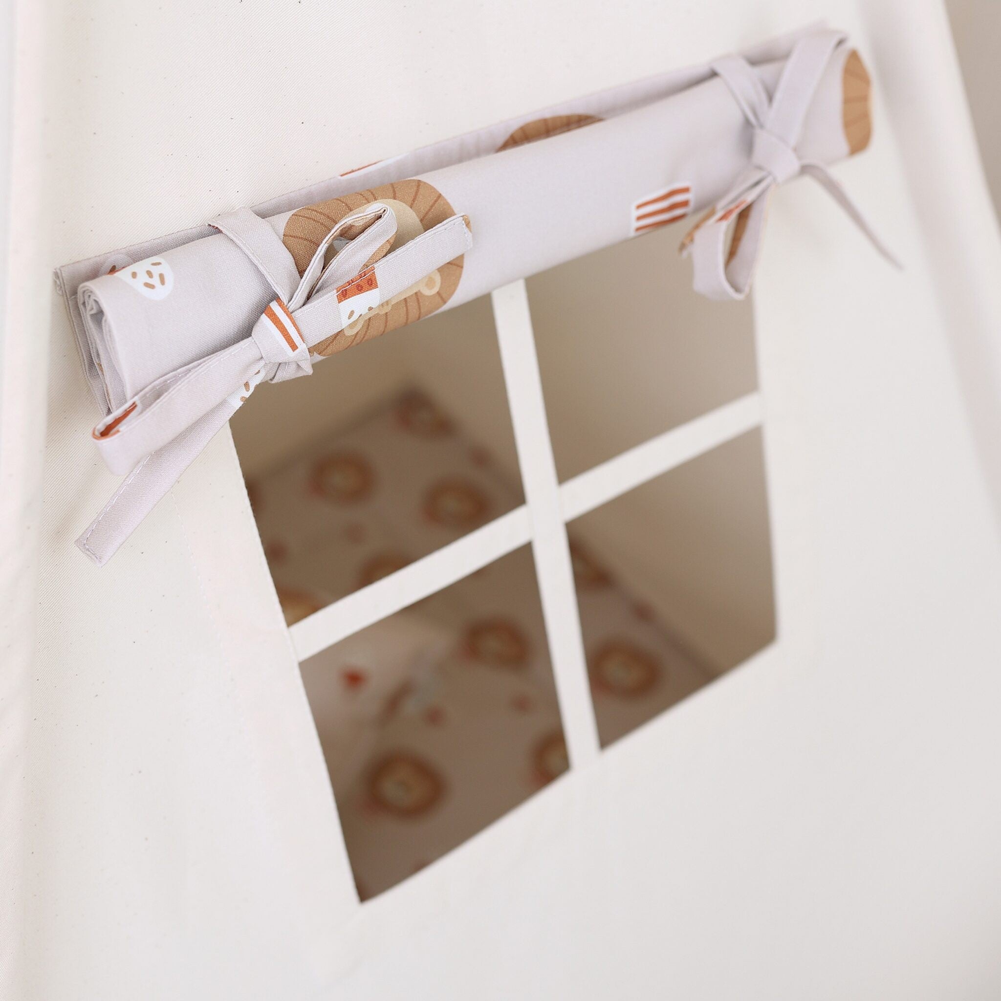 Close-up of the built-in fabric window on the Lions Teepee Tent