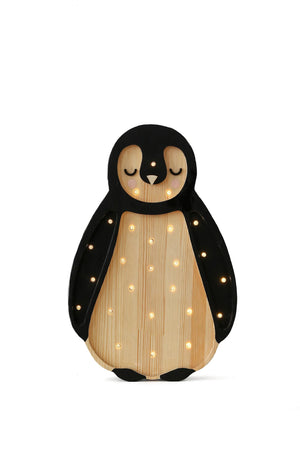 Wooden penguin night light with black and natural wood finish, embedded warm LED lights, closed eyes, pink cheeks