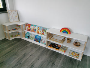 One Little Pine modular children’s furniture setup with front-facing bookshelf, curved shelf and low storage unit