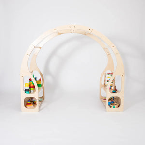 Front view of Montessori Play Stand with toys displayed on child-height shelving