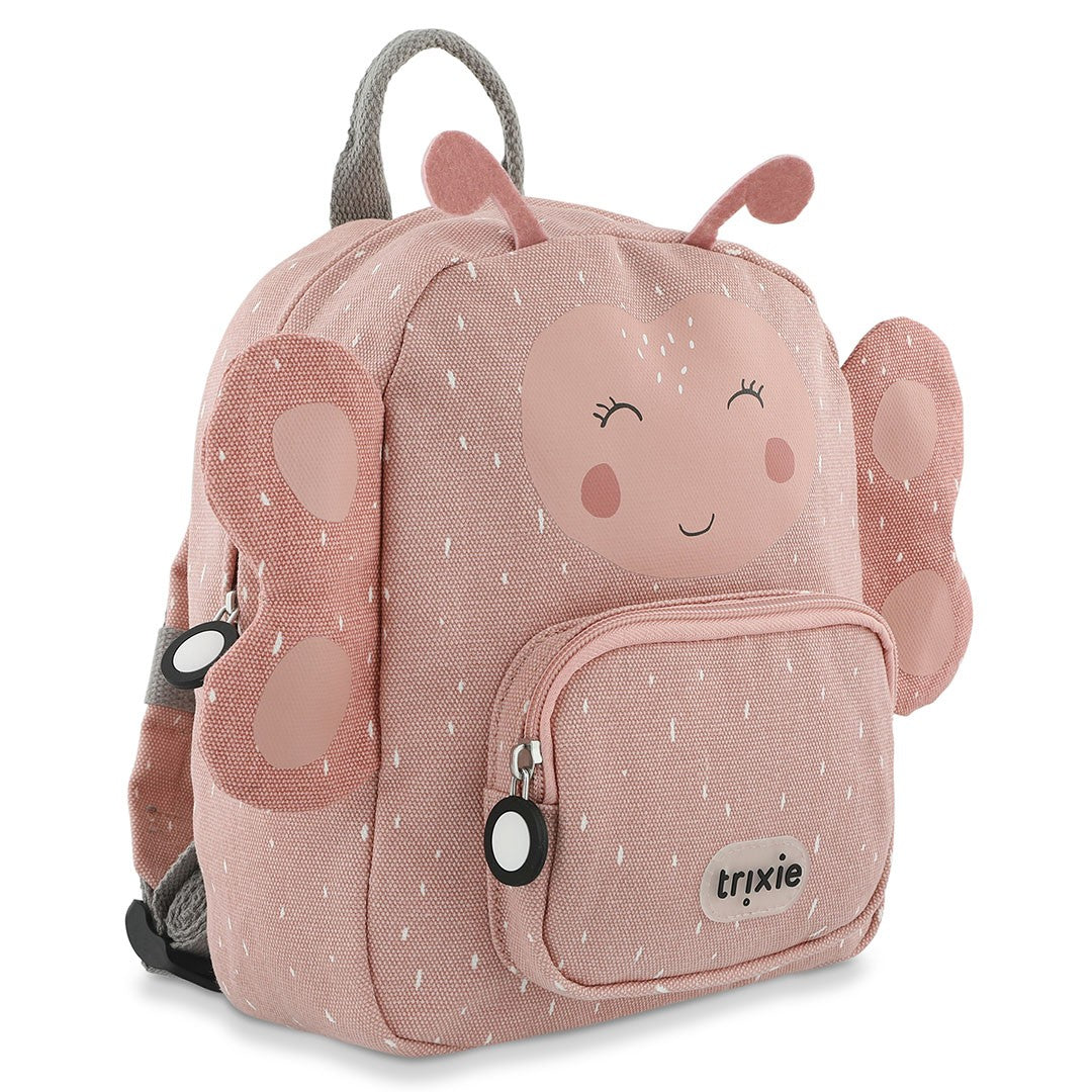 Three-quarter view of pink Trixie Mrs. Butterfly backpack with wings, antennae and front zip pocket