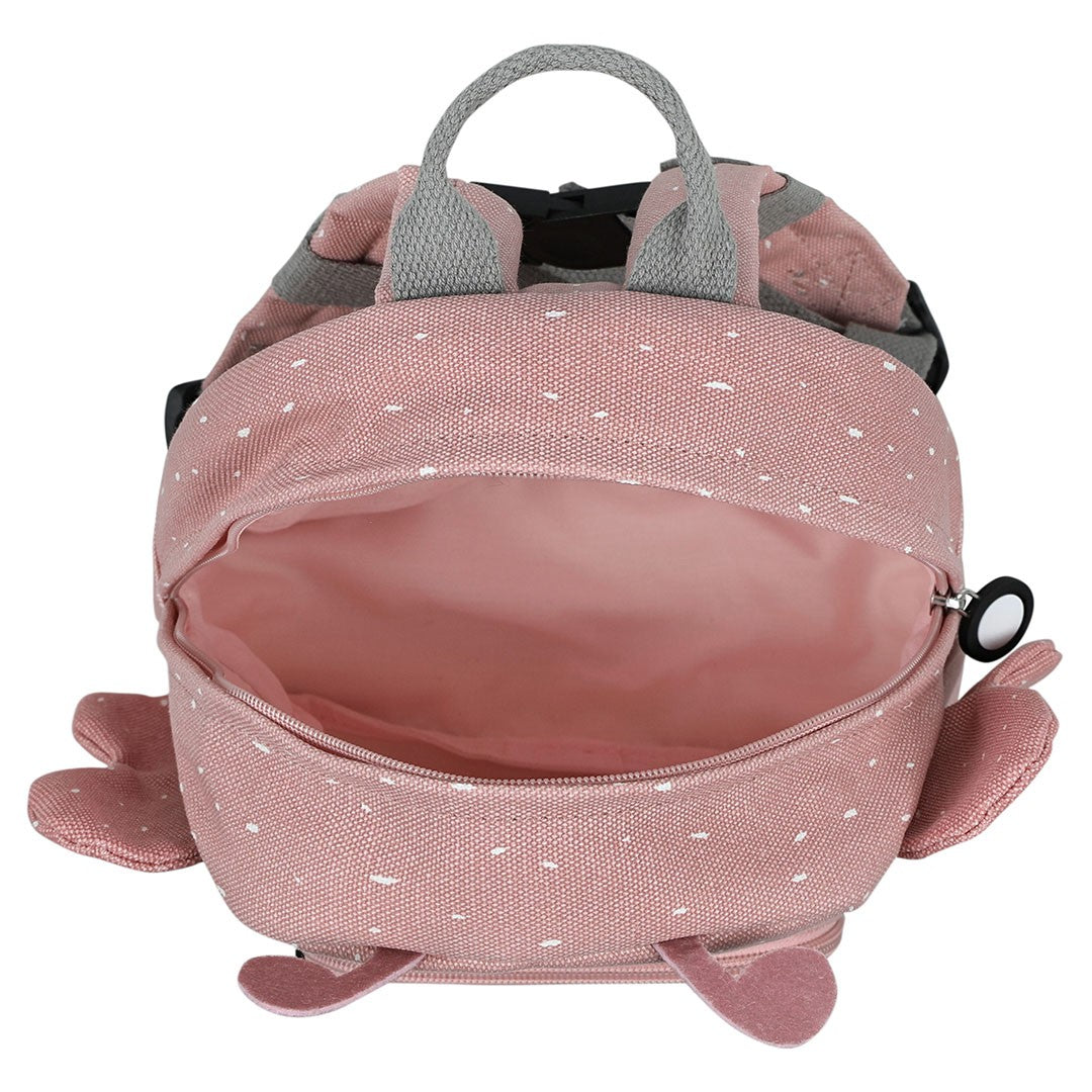 Open main compartment of Trixie Mrs. Butterfly backpack showing pink lining and top carry handle