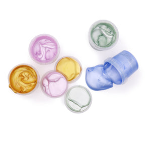 Top view of Neogrün glitter finger paints in pink, gold, jade and sapphire with creamy shimmering texture