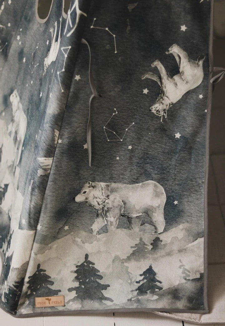 Close-up of the teepee fabric showing a bear, mountain forest and hand-drawn constellations
