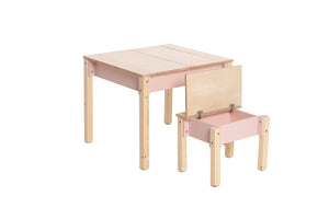 Pink kids table closed with storage compartment open beneath matching chair seat