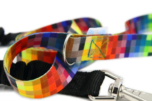 Colorful pixel-patterned dog leash with black handle and silver clasp, artisan pet accessory