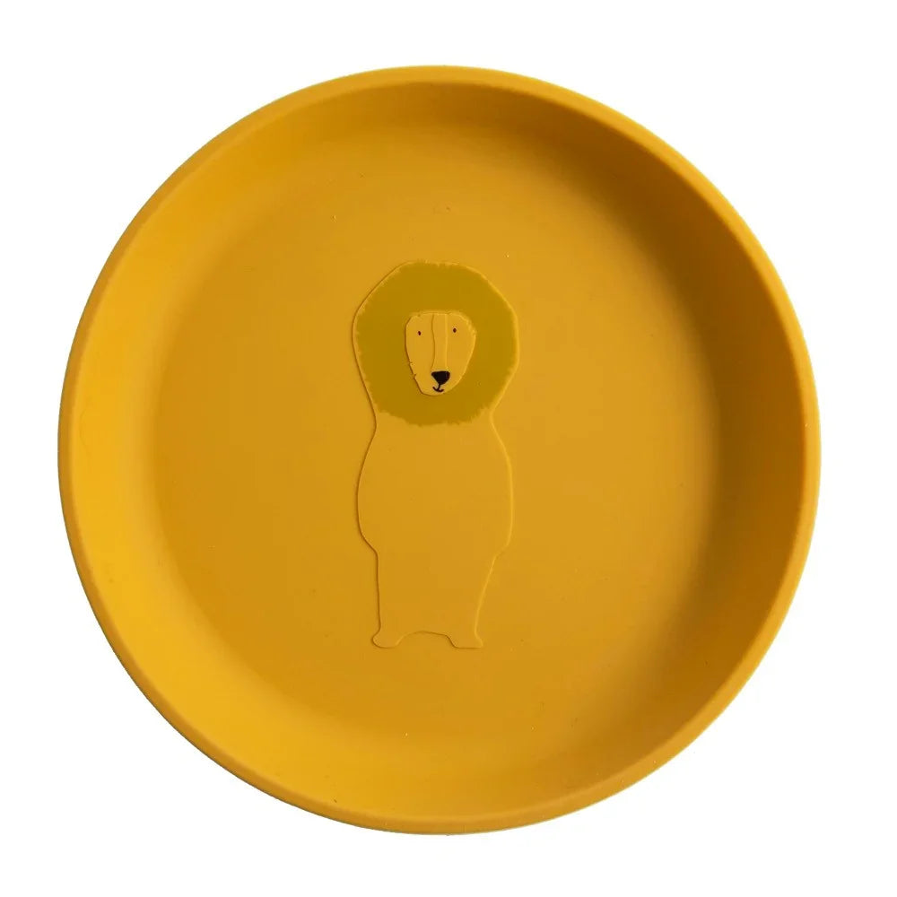 Plato infantil de silicona amarillo con un simpático diseño de león en el centro