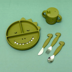Green silicone dinosaur-themed sippy cup, plate, and cutlery set for toddlers