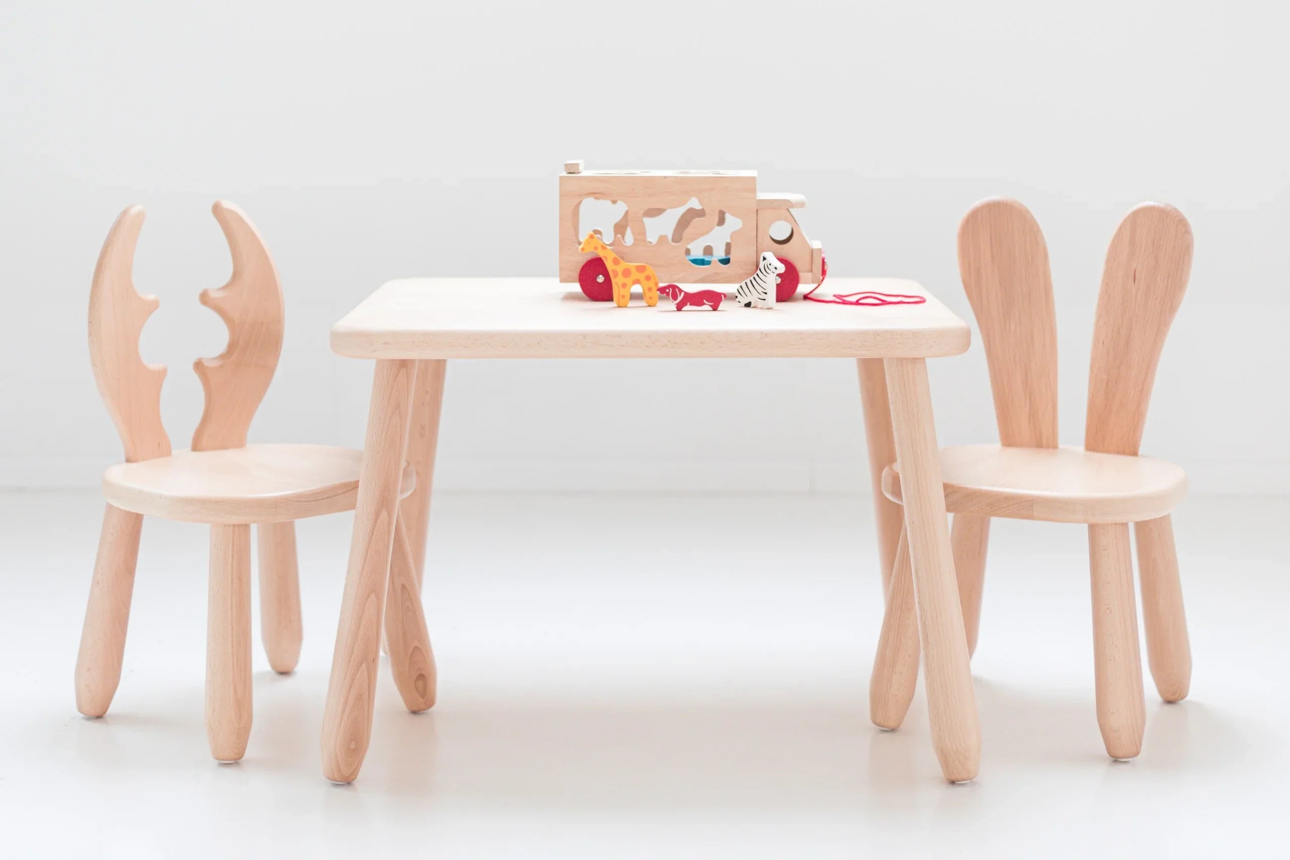 Set aus Tisch und 2 Stühlen – Wild
