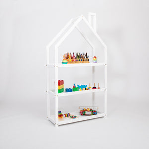 White house-shaped children’s shelf with coloured pencils, building blocks and educational toys