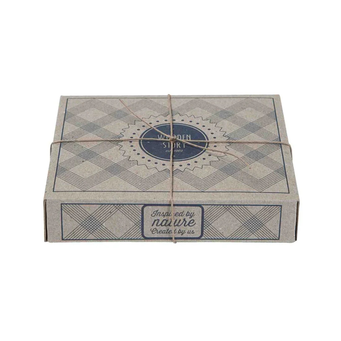 Wooden Story gift box with geometric pattern, twine tie, and 'Inspired by nature' label, eco-friendly packaging