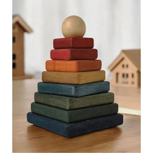 Wooden Story colourful stacking pyramid displayed in a natural children's room